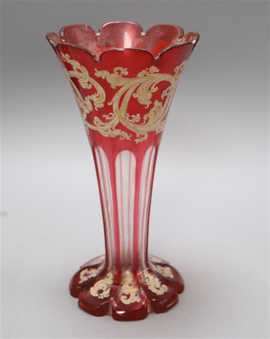 A Bohemian enamelled glass trumpet vase